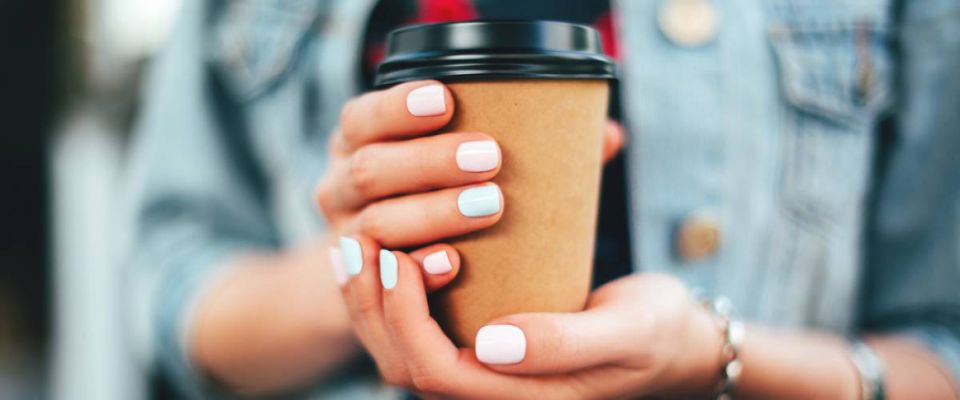 <cite>Efetova Anna / Shutterstock</cite> <br>Suze Orman says your carryout coffee habit costs you $1 million.<br>